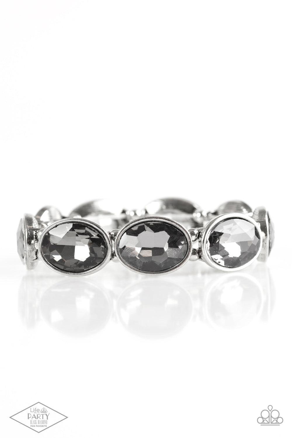 DIVA In Disguise Silver Rhinestone Bracelet - Paparazzi Accessories- lightbox - CarasShop.com - $5 Jewelry by Cara Jewels