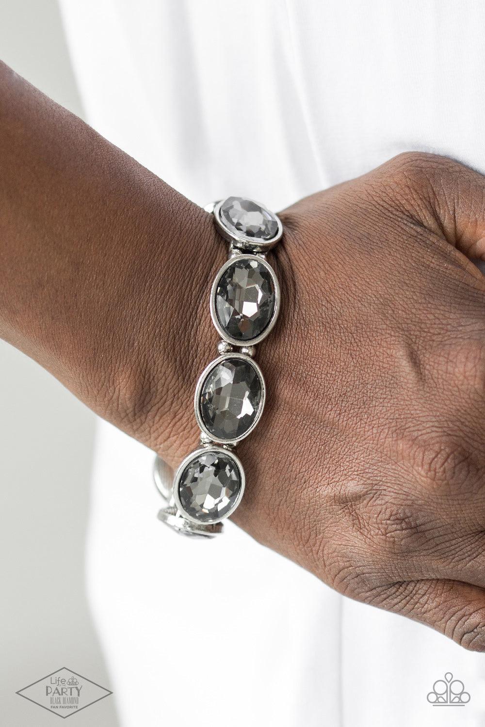 DIVA In Disguise Silver Rhinestone Bracelet - Paparazzi Accessories- on model - CarasShop.com - $5 Jewelry by Cara Jewels