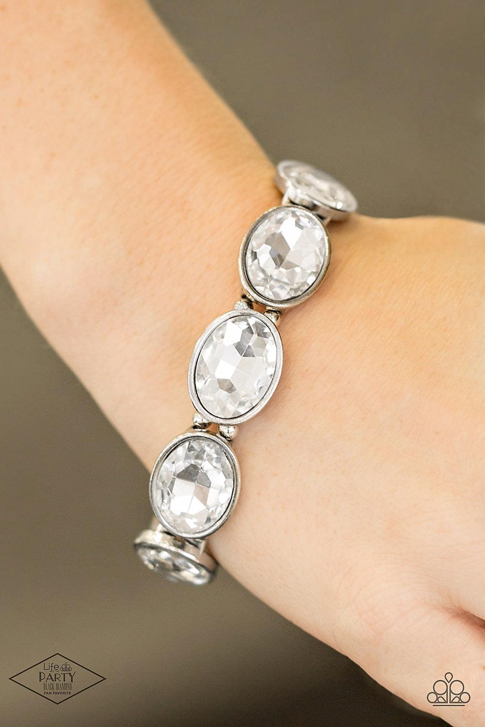 DIVA In Disguise White Rhinestone Bracelet - Paparazzi Accessories-on model - CarasShop.com - $5 Jewelry by Cara Jewels