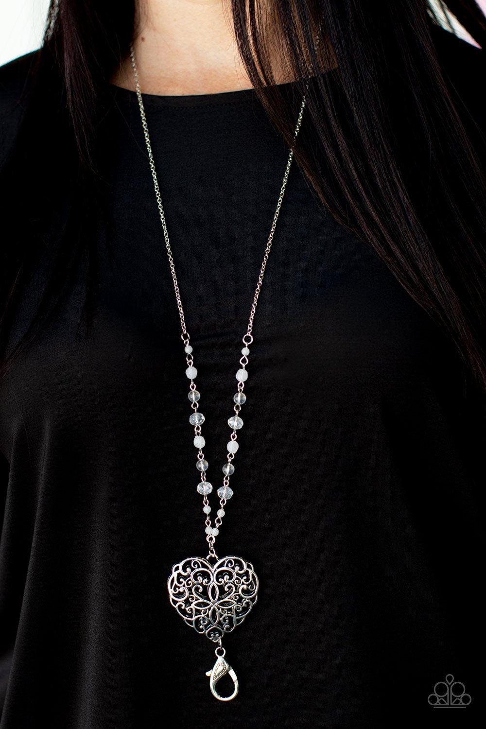 Doting Devotion White and Silver Filigree Heart Lanyard Necklace - Paparazzi Accessories 2021 Convention Exclusive- model - CarasShop.com - $5 Jewelry by Cara Jewels