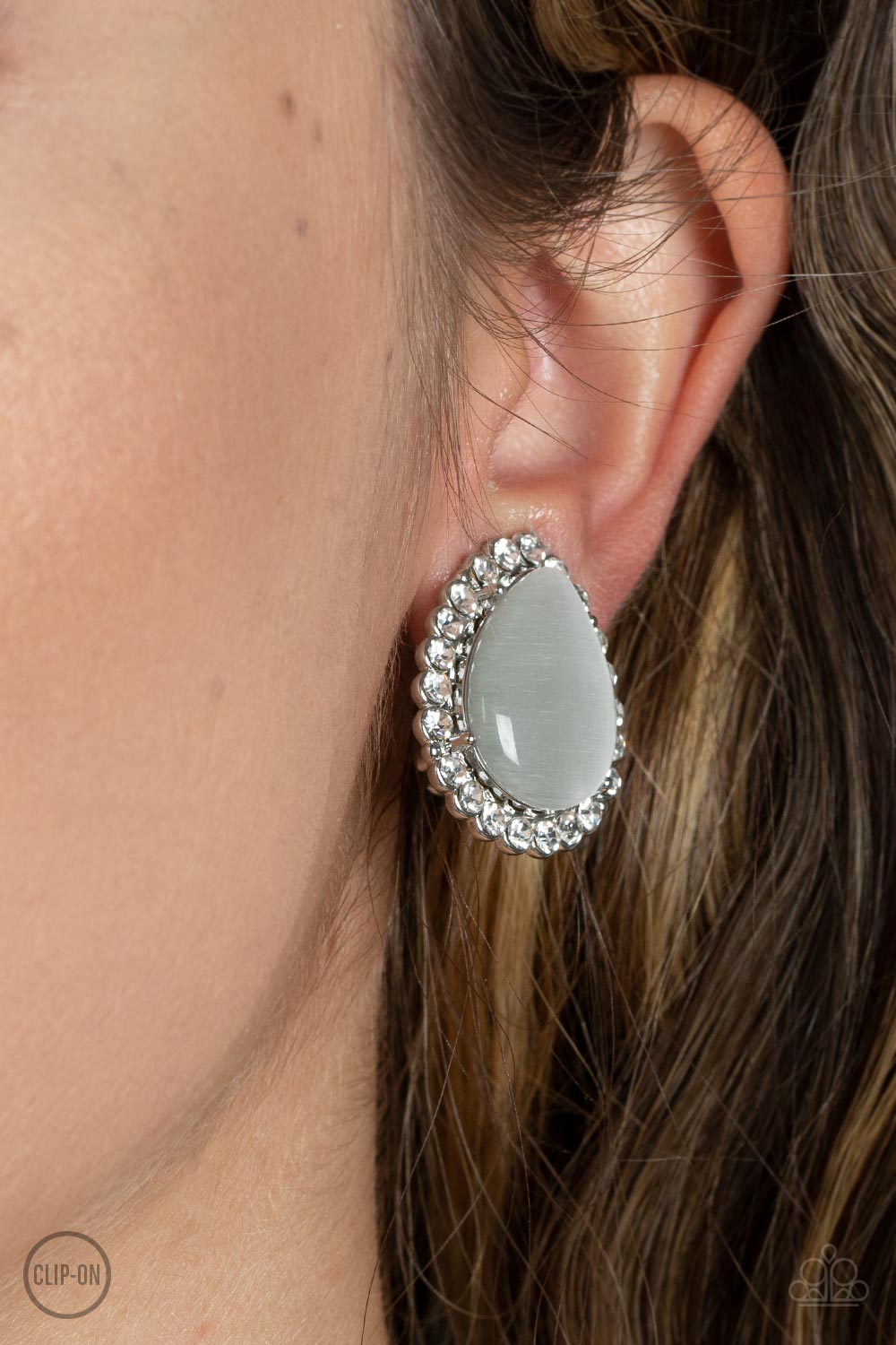 Downright Demure White Cat&#39;s Eye Clip On Earrings - Paparazzi Accessories-on model - CarasShop.com - $5 Jewelry by Cara Jewels