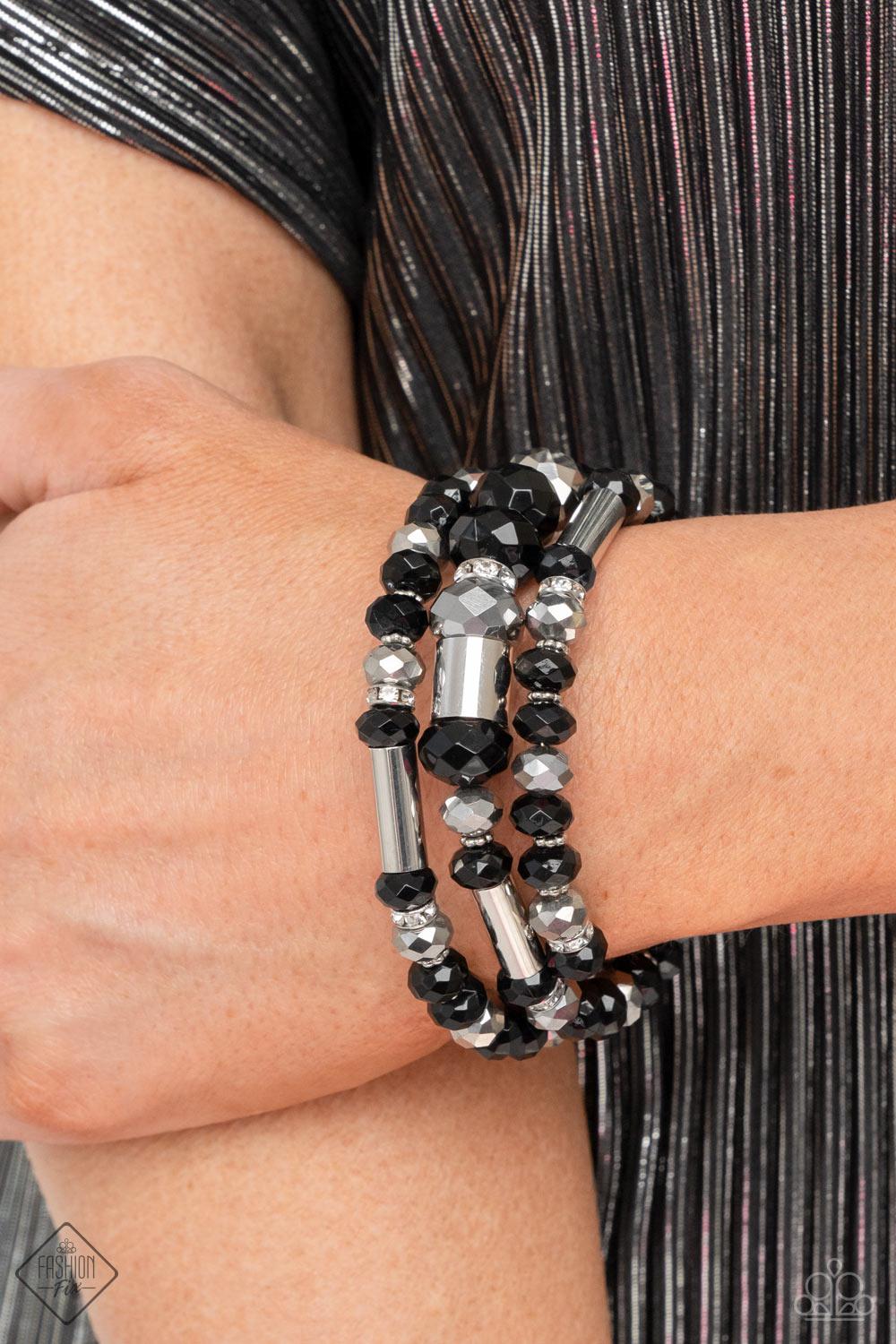 Dynamic Dazzle Black and Silver Infinity Wrap Bracelet - Paparazzi Accessories- on model - CarasShop.com - $5 Jewelry by Cara Jewels