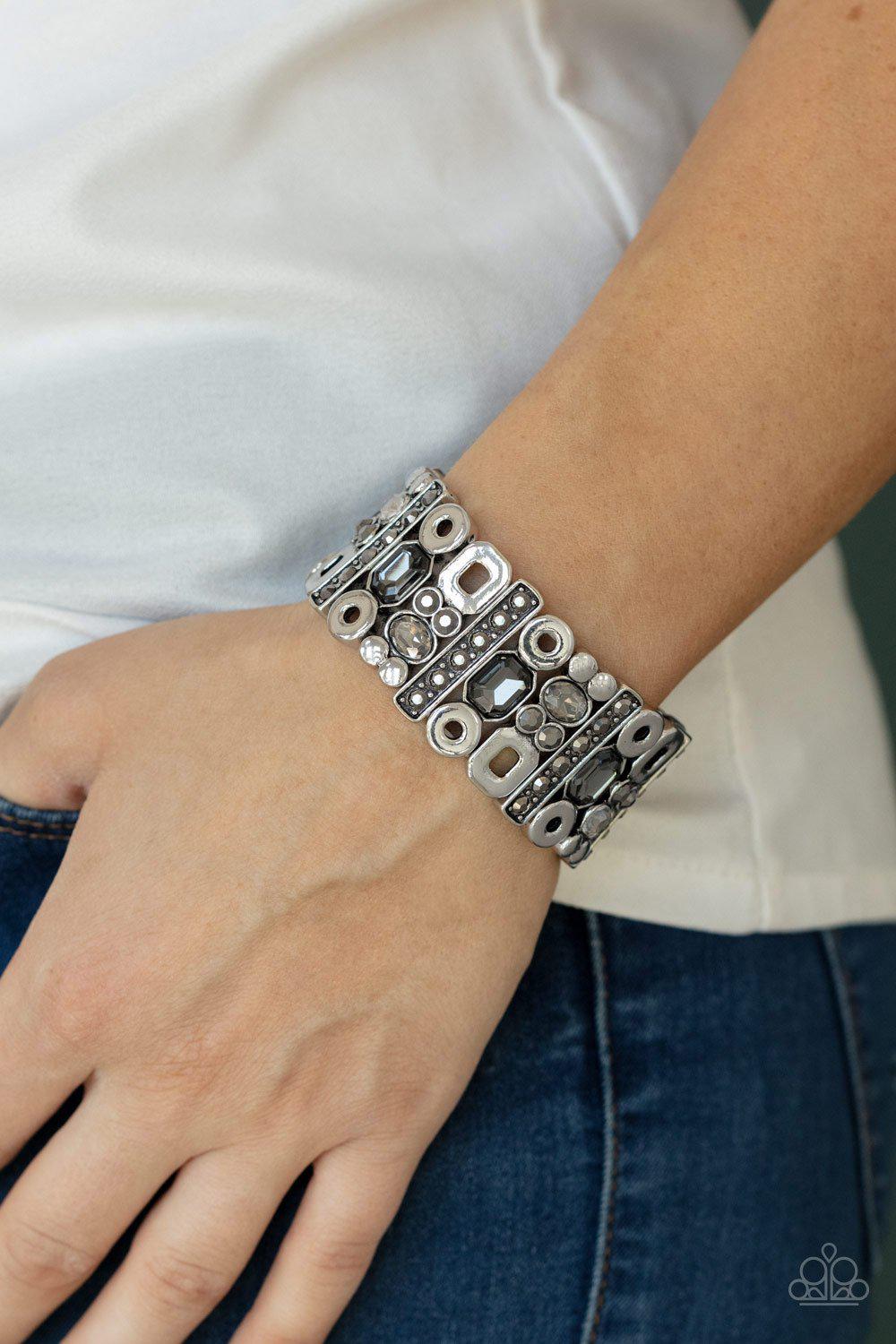 Dynamically Diverse Silver Hematite and Smoky Rhinestone Bracelet - Paparazzi Accessories 2021 Convention Exclusive- model - CarasShop.com - $5 Jewelry by Cara Jewels