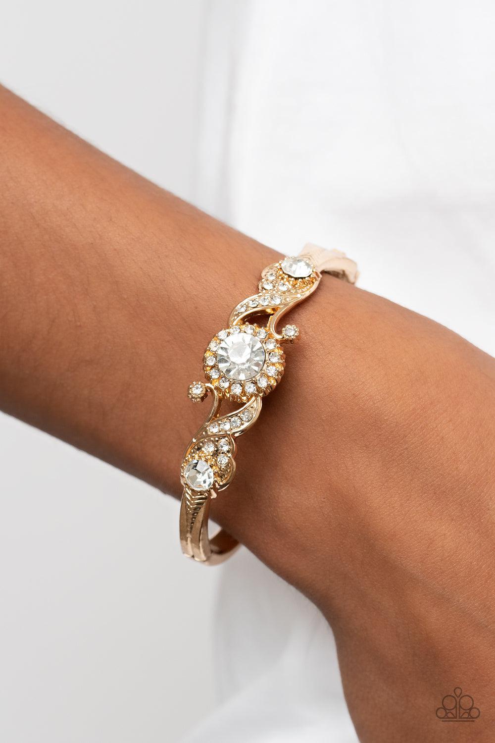 Expert Elegance Gold &amp; White Rhinestone Bracelet - Paparazzi Accessories-on model - CarasShop.com - $5 Jewelry by Cara Jewels