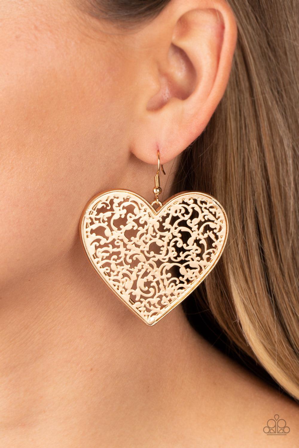 Fairest in the Land Gold Heart Earrings - Paparazzi Accessories-on model - CarasShop.com - $5 Jewelry by Cara Jewels