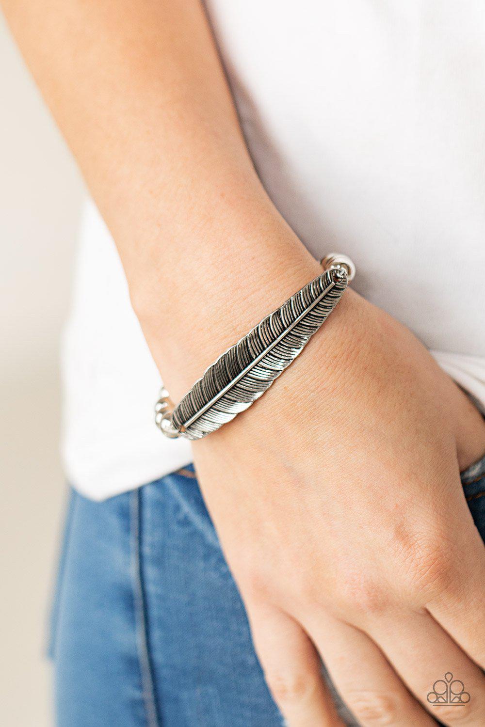 Featherlight Fashion Silver Feather Bracelet - Paparazzi Accessories- model - CarasShop.com - $5 Jewelry by Cara Jewels