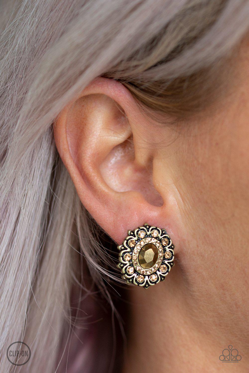 Flowering Dazzle Brass Clip-On Earrings - Paparazzi Accessories - model -CarasShop.com - $5 Jewelry by Cara Jewels