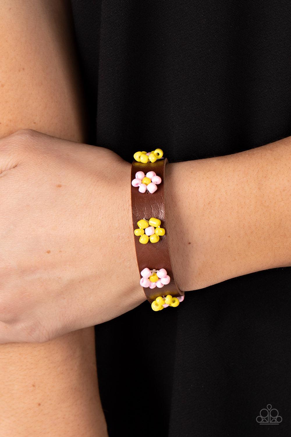 Flowery Frontier Pink &amp; Yellow Flower Urban Slide Bracelet-on model - CarasShop.com - $5 Jewelry by Cara Jewels