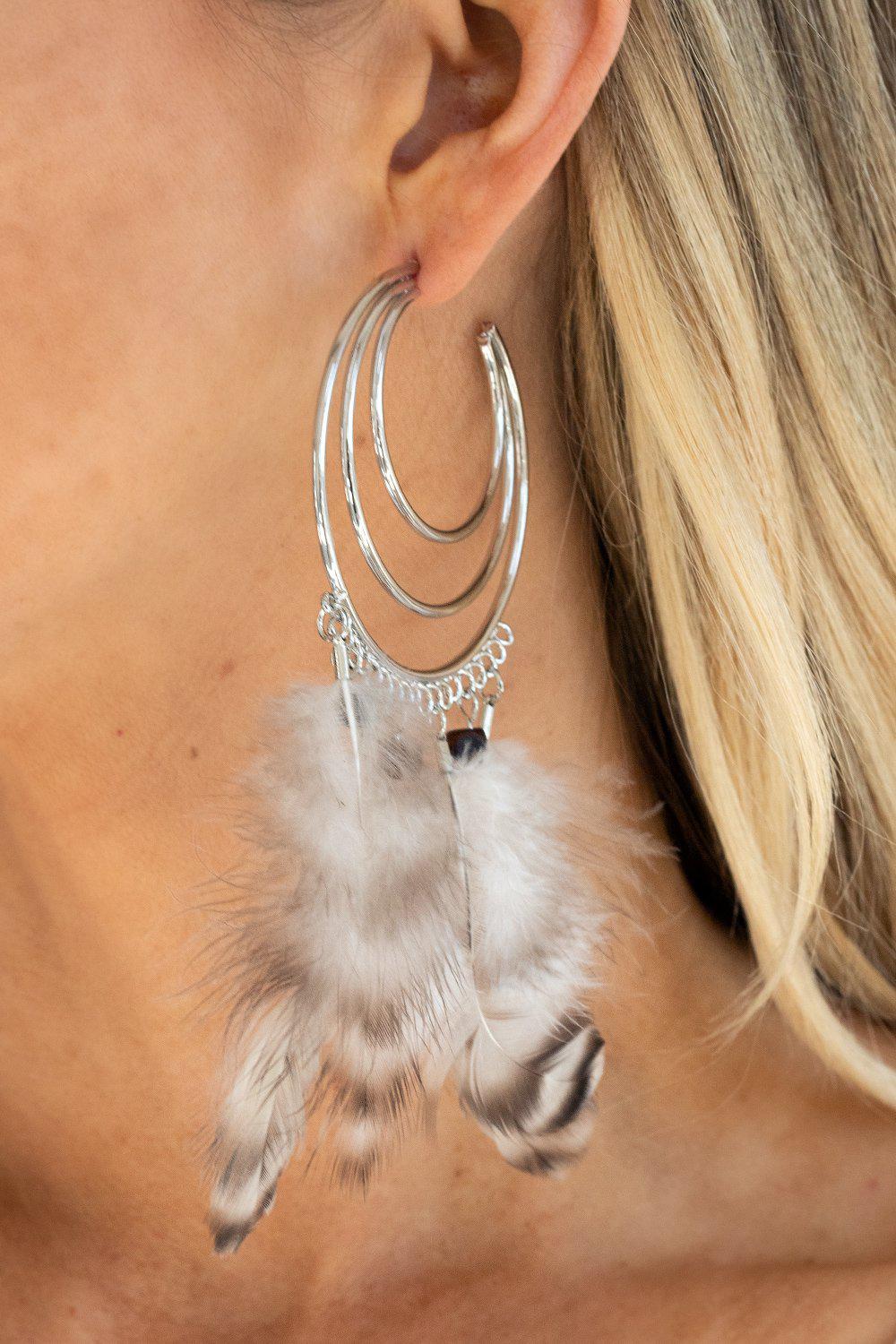 Freely Free Bird Brown Feather and Silver Hoop Earrings - Paparazzi Accessories - model -CarasShop.com - $5 Jewelry by Cara Jewels