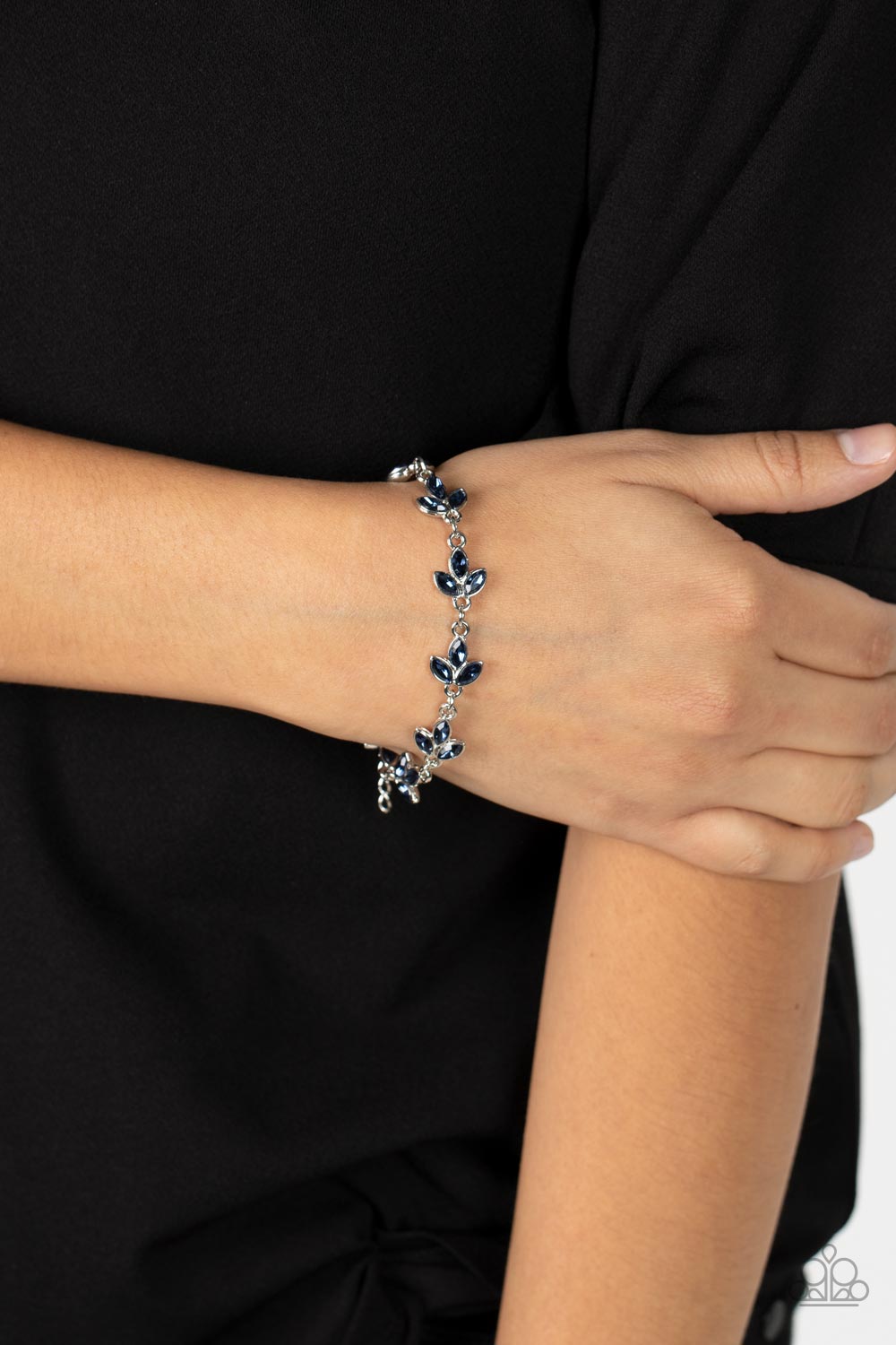 Gala Garland Blue Rhinestone Bracelet - Paparazzi Accessories- on model - CarasShop.com - $5 Jewelry by Cara Jewels