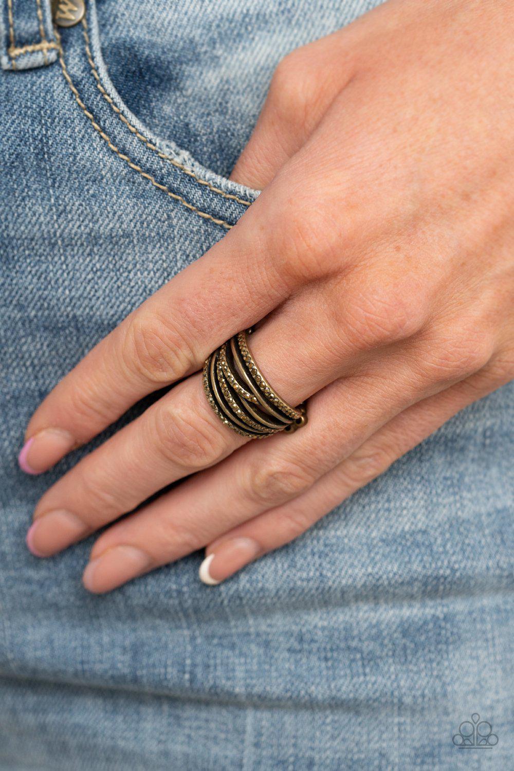 Get a Move on! Brass Rhinestone Ring - Paparazzi Accessories - model -CarasShop.com - $5 Jewelry by Cara Jewels