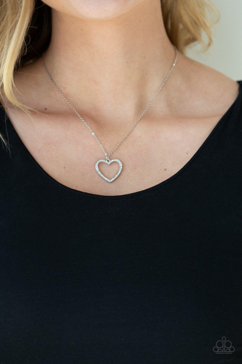 GLOW by Heart White Rhinestone Heart Necklace - Paparazzi Accessories - model -CarasShop.com - $5 Jewelry by Cara Jewels