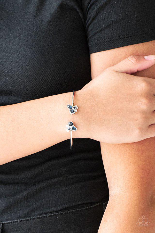 Going for Glitter Blue Rhinestone Cuff Bracelet - Paparazzi Accessories- on model - CarasShop.com - $5 Jewelry by Cara Jewels