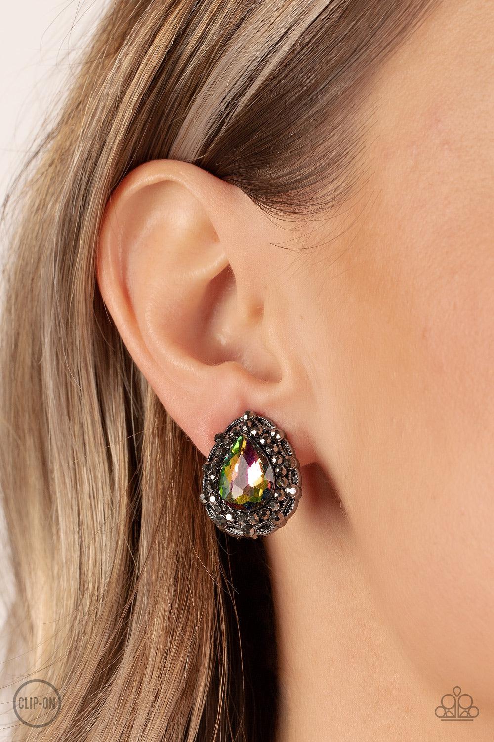 Haute Happy Hour Multi Oil Spill Clip-On Earrings - Paparazzi Accessories-on model - CarasShop.com - $5 Jewelry by Cara Jewels