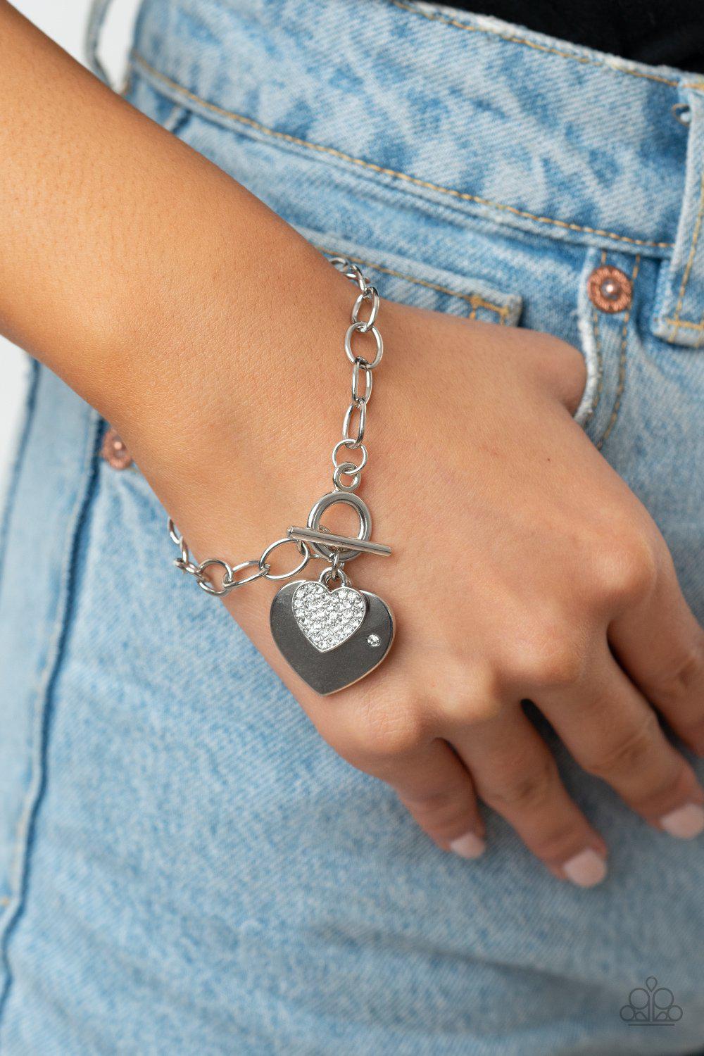 Heartbeat Bedazzle White and Silver Heart Bracelet - Paparazzi Accessories - model -CarasShop.com - $5 Jewelry by Cara Jewels