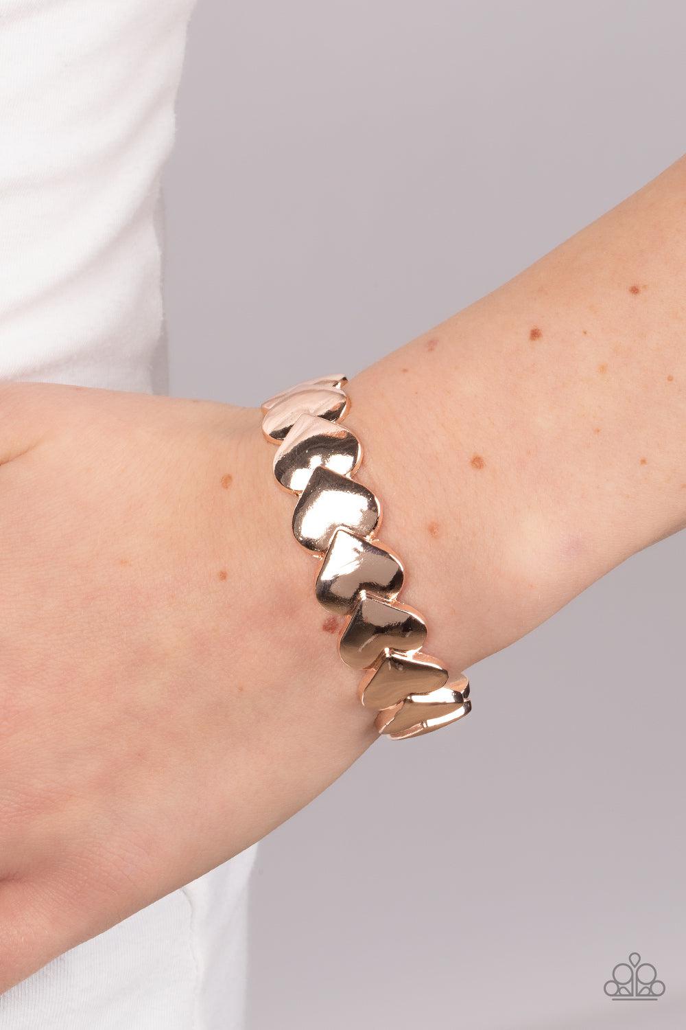 Hearts Galore Rose Gold Cuff Bracelet - Paparazzi Accessories-on model - CarasShop.com - $5 Jewelry by Cara Jewels