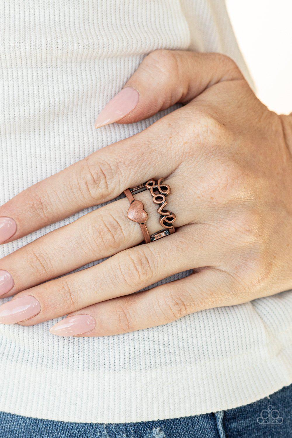 Heartstring Harmony Copper &quot;Love&quot; Ring - Paparazzi Accessories - model -CarasShop.com - $5 Jewelry by Cara Jewels