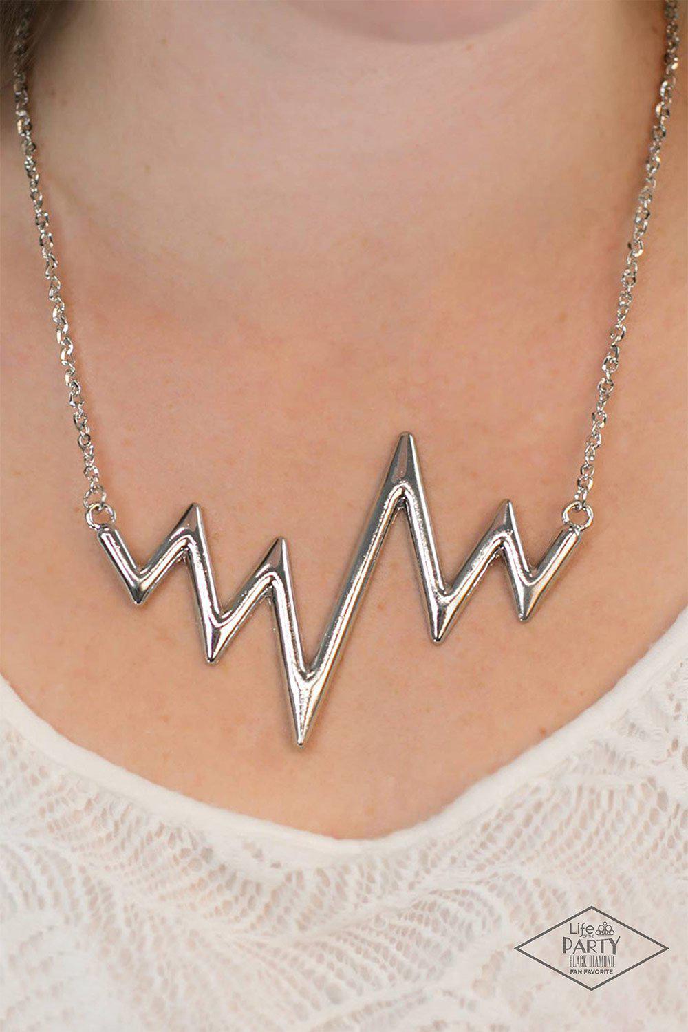In A Heartbeat Silver Necklace - Paparazzi Accessories-CarasShop.com - $5 Jewelry by Cara Jewels