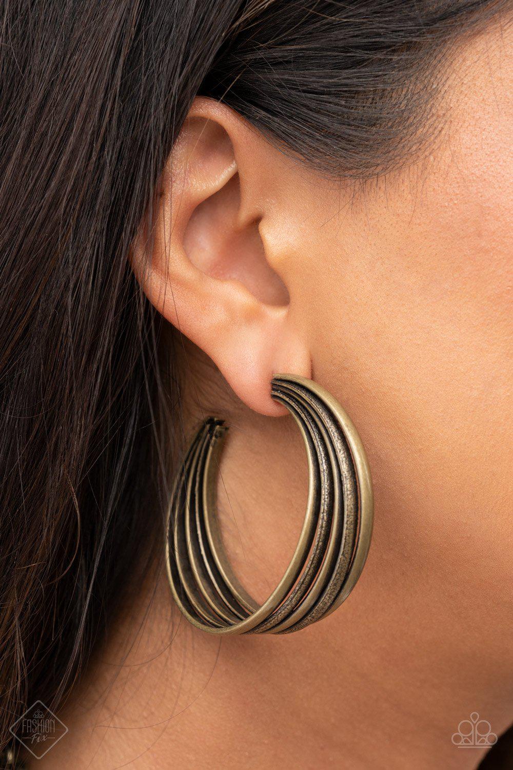In Sync Brass Hoop Earrings - Paparazzi Accessories- model - CarasShop.com - $5 Jewelry by Cara Jewels