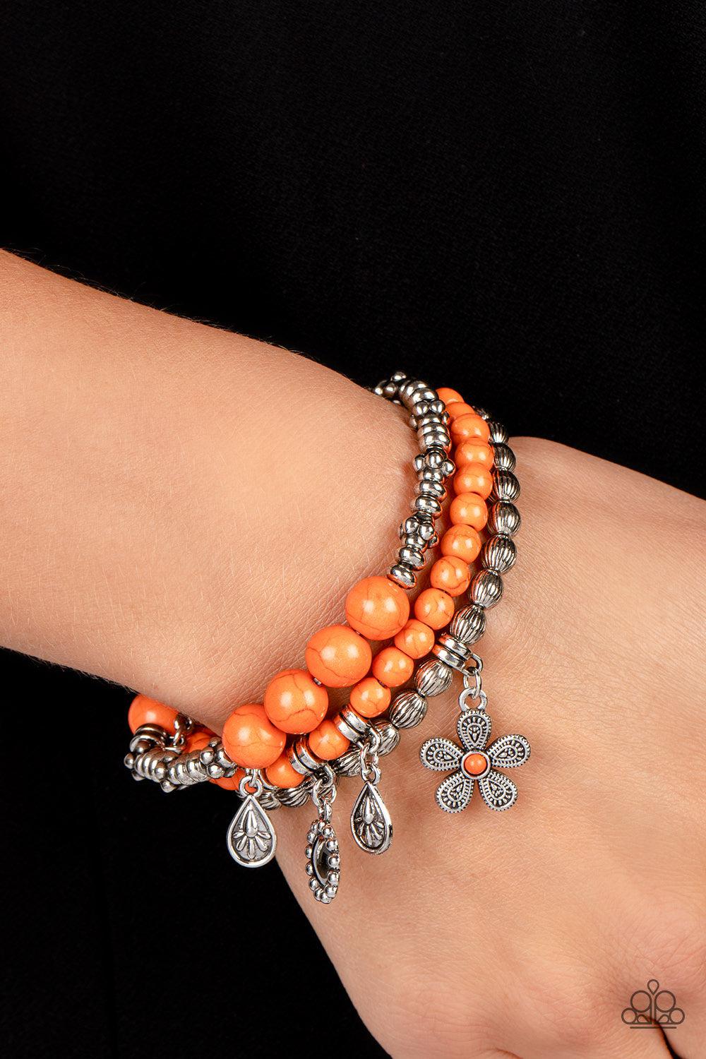 Individual Inflorescence Orange Bracelet - Paparazzi Accessories-on model - CarasShop.com - $5 Jewelry by Cara Jewels