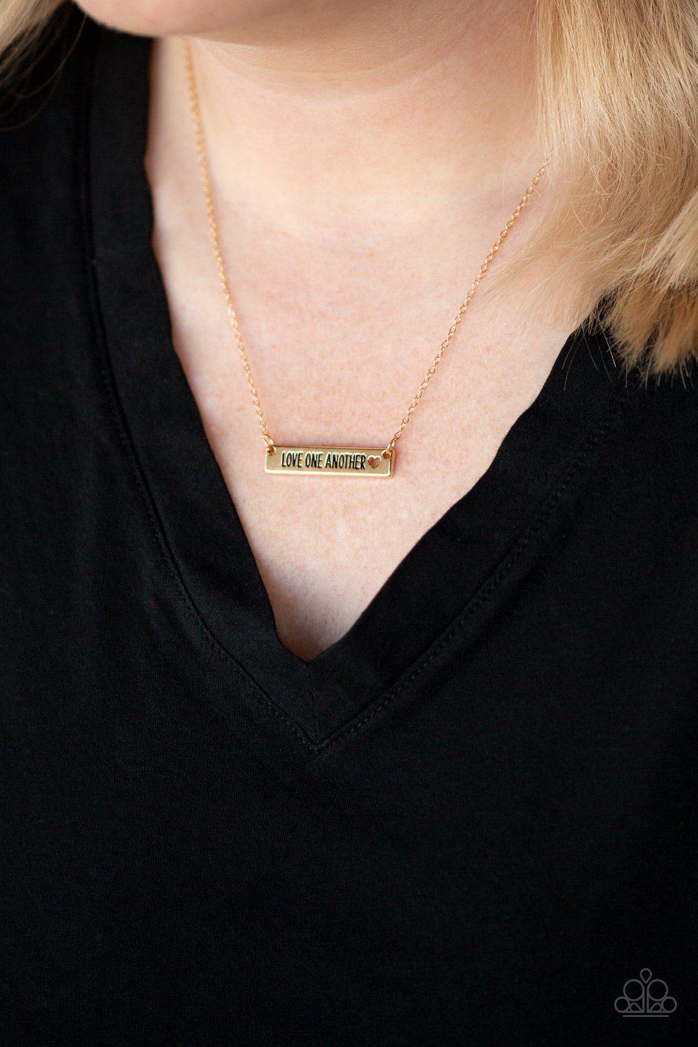 Love One Another Gold Word Necklace - Paparazzi Accessories-CarasShop.com - $5 Jewelry by Cara Jewels
