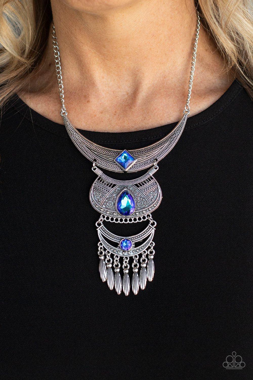 Lunar Enchantment Blue UV Shimmer Rhinestone and Silver Statement Necklace - Paparazzi Accessories 2021 Convention Exclusive- lightbox - CarasShop.com - $5 Jewelry by Cara Jewels
