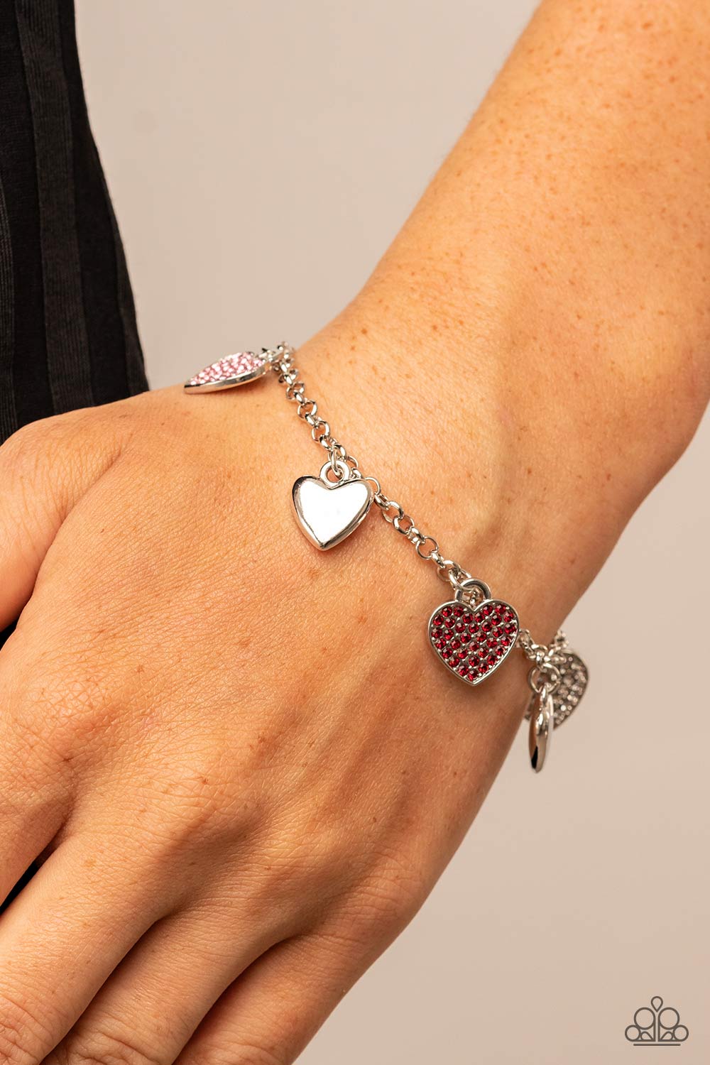 Lusty Lockets Multi Red and Pink Heart Charm Bracelet - Paparazzi Accessories- on model - CarasShop.com - $5 Jewelry by Cara Jewels