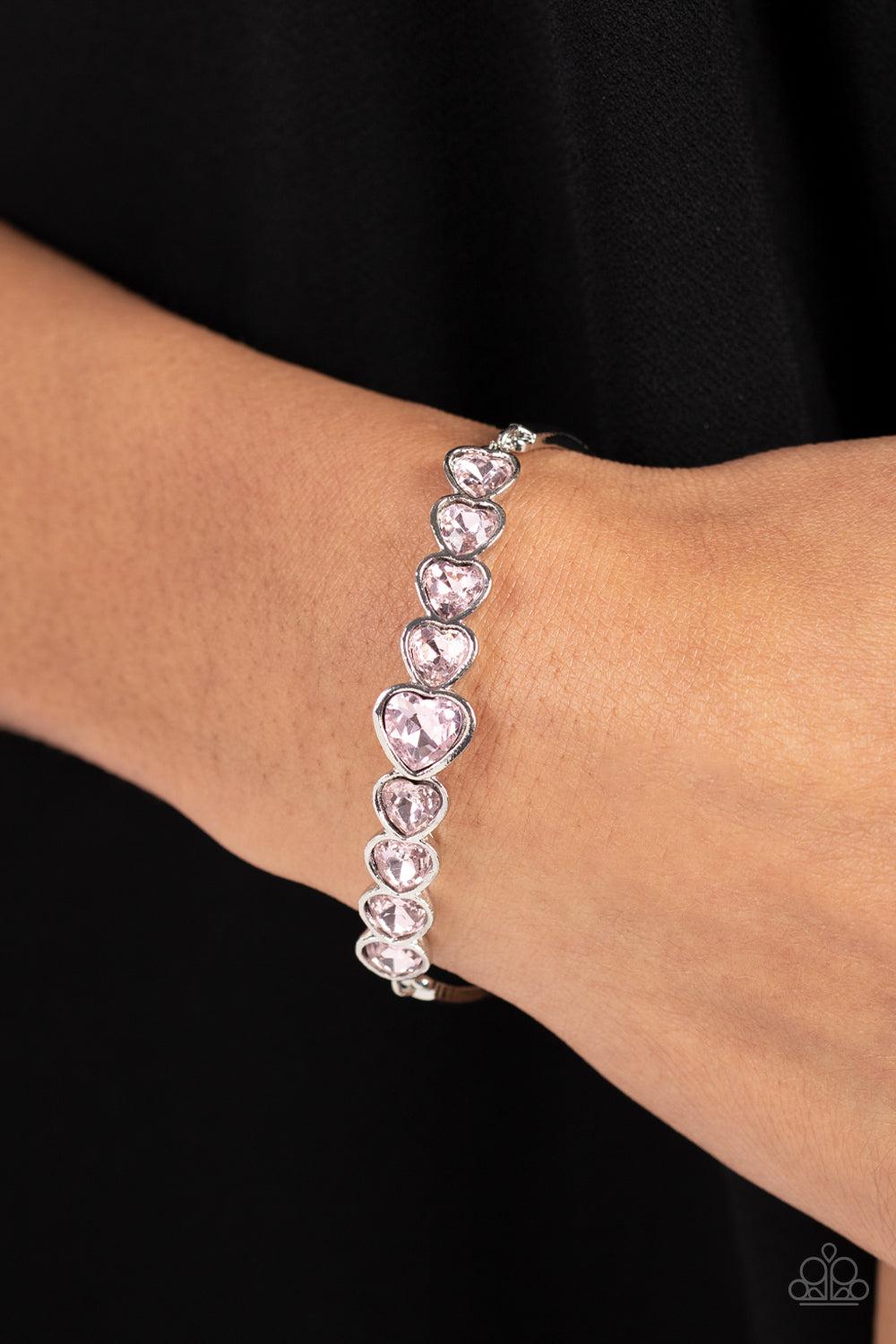 Lusty Luster Pink Rhinestone Heart Bracelet - Paparazzi Accessories-on model - CarasShop.com - $5 Jewelry by Cara Jewels