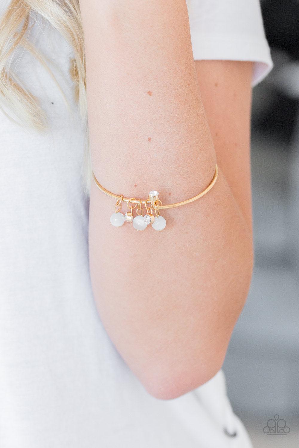 Marine Melody Gold Bracelet - Paparazzi Accessories- on model - CarasShop.com - $5 Jewelry by Cara Jewels