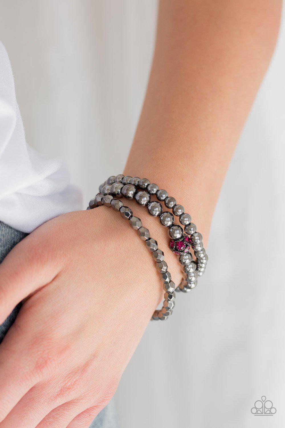 Noticeably Noir Pink Rhinestone and Gunmetal Bracelet Set - Paparazzi Accessories-CarasShop.com - $5 Jewelry by Cara Jewels