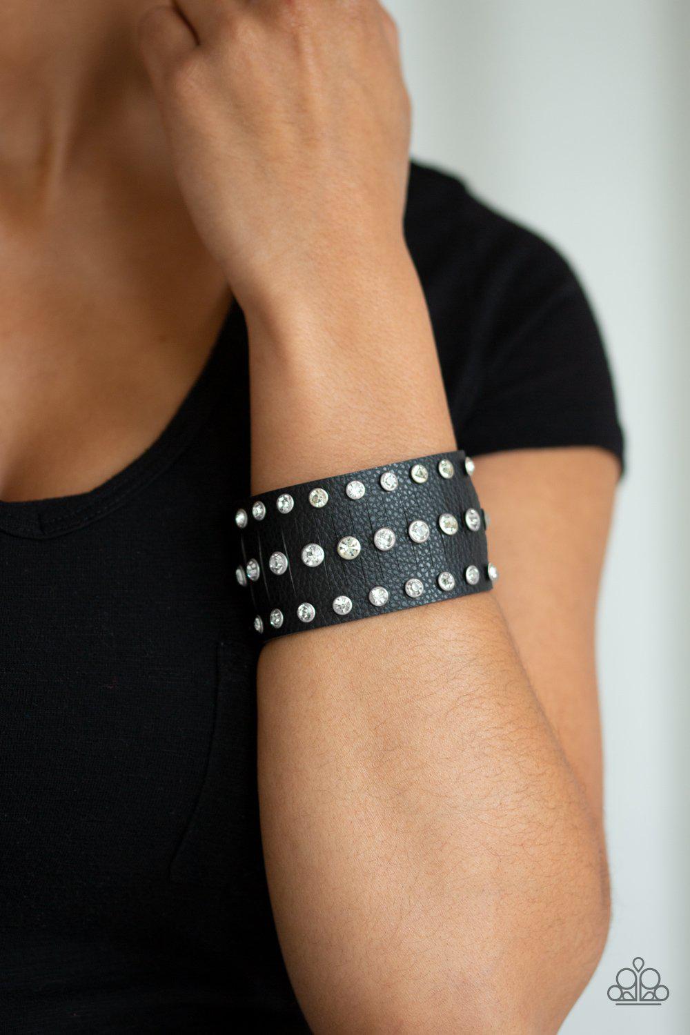 Now Taking The Stage Black Leather and White Rhinestone Urban Wrap Snap Bracelet - Paparazzi Accessories-CarasShop.com - $5 Jewelry by Cara Jewels