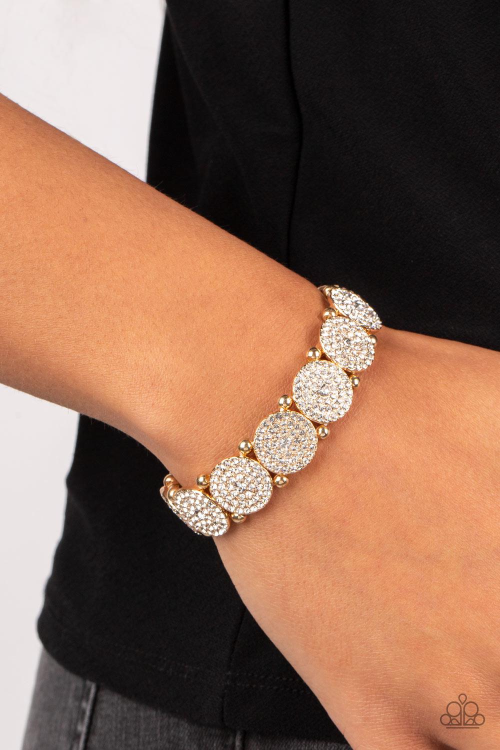 Palace Intrigue Gold &amp; White Rhinestone Bracelet - Paparazzi Accessories-on model - CarasShop.com - $5 Jewelry by Cara Jewels