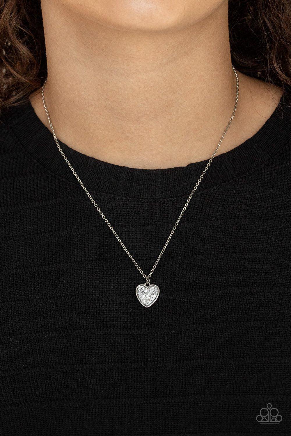 Pitter-Patter, Goes My Heart Silver Heart Necklace - Paparazzi Accessories- model - CarasShop.com - $5 Jewelry by Cara Jewels