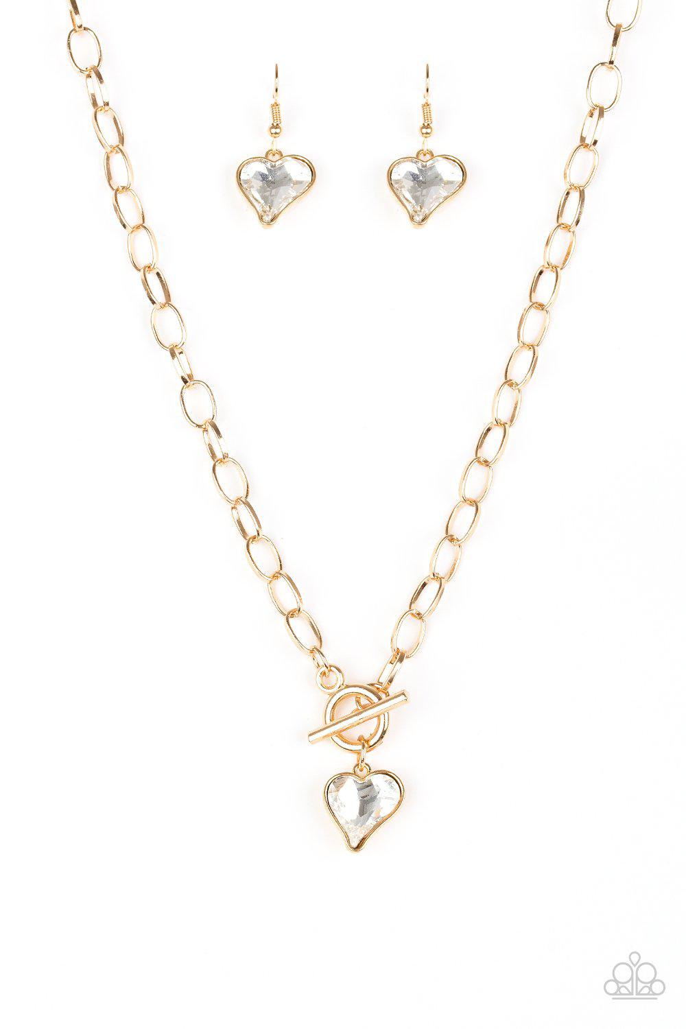 Princeton Princess Gold and White Rhinestone Heart Toggle Necklace - Paparazzi Accessories - lightbox -CarasShop.com - $5 Jewelry by Cara Jewels