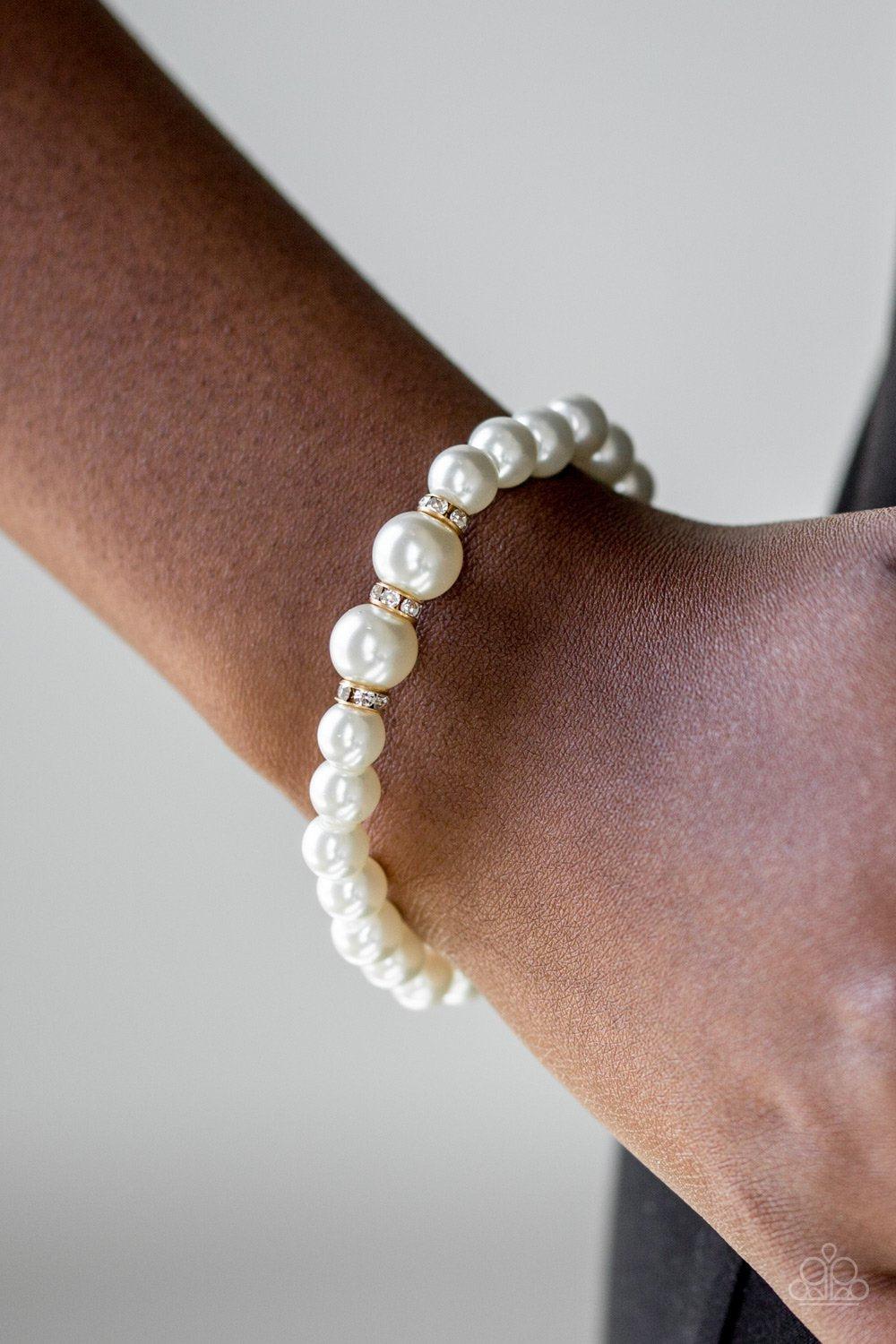 Radiantly Royal Gold and White Pearl Bracelet - Paparazzi Accessories-CarasShop.com - $5 Jewelry by Cara Jewels