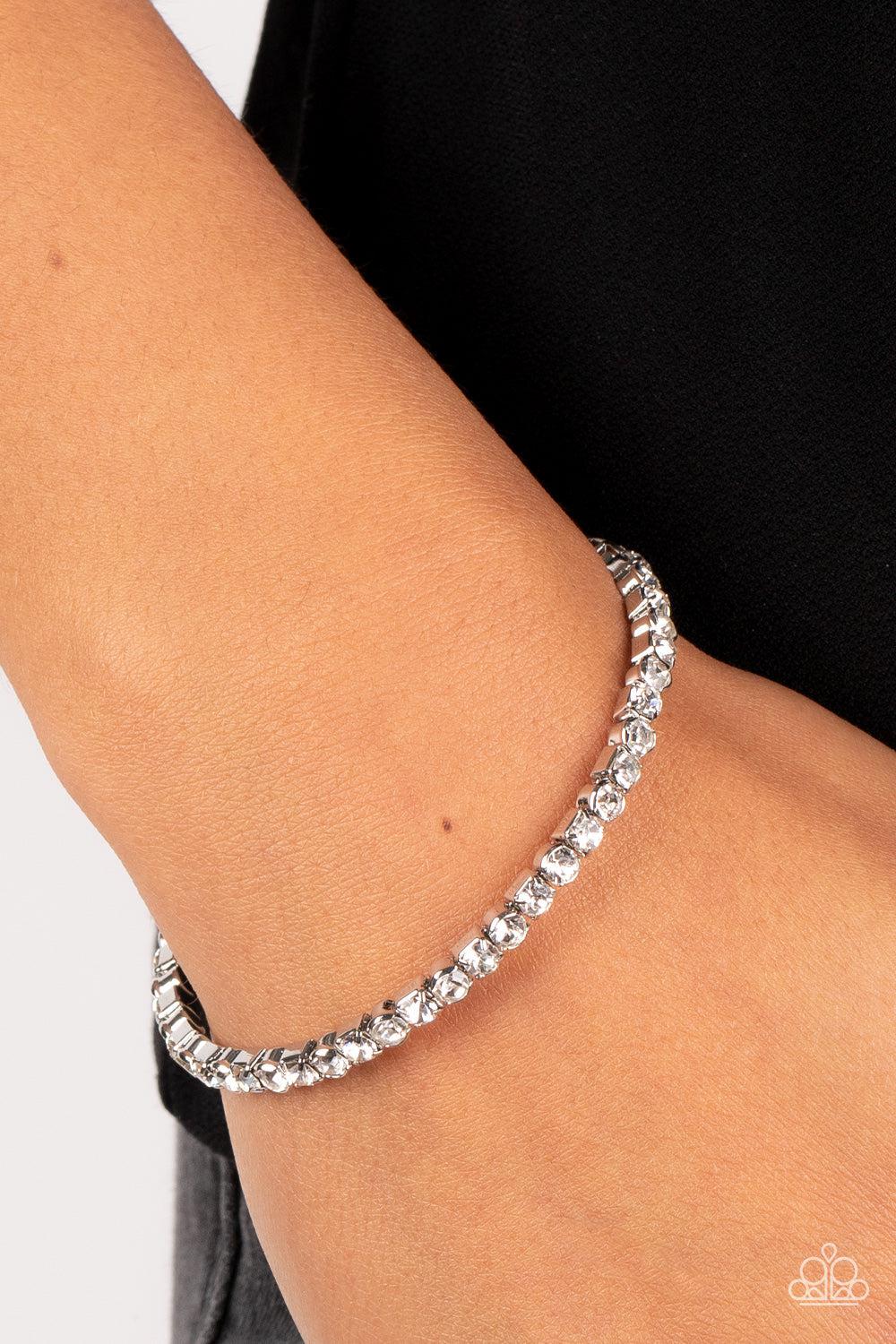 Rhinestone Spell White Bracelet - Paparazzi Accessories-on model - CarasShop.com - $5 Jewelry by Cara Jewels