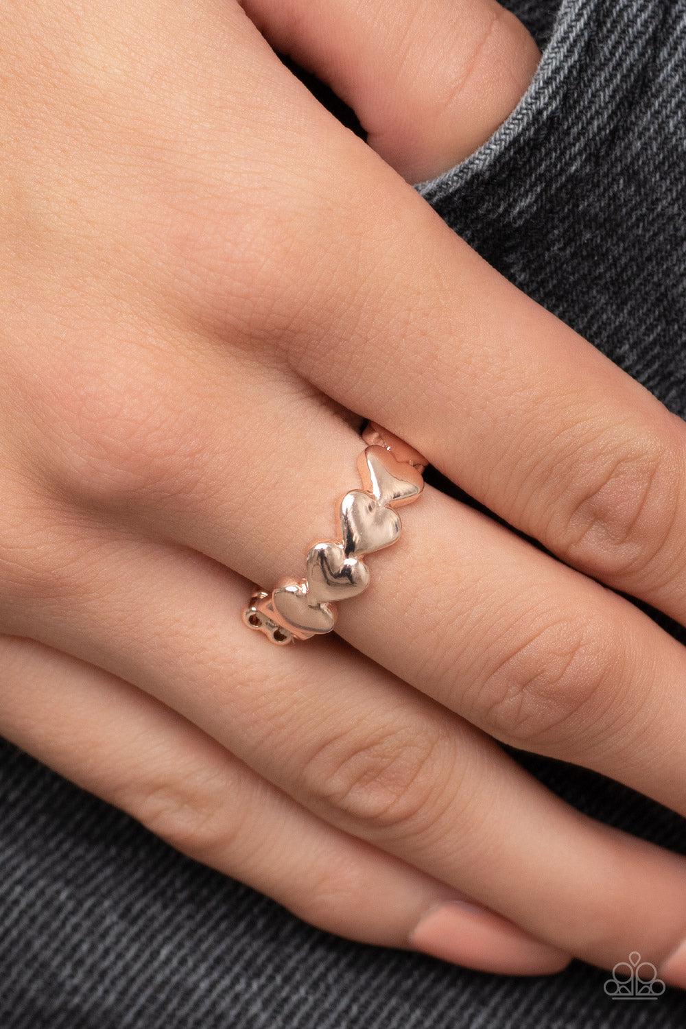 Rhythm of Love Rose Gold Ring - Paparazzi Accessories-on model - CarasShop.com - $5 Jewelry by Cara Jewels
