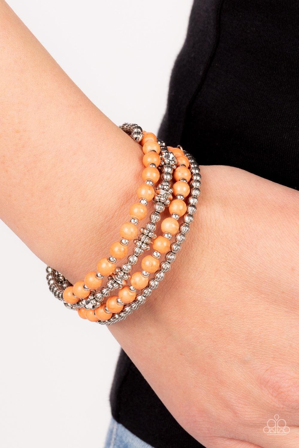 Road Trip Remix Orange Stone Coil Bracelet - Paparazzi Accessories-on model - CarasShop.com - $5 Jewelry by Cara Jewels