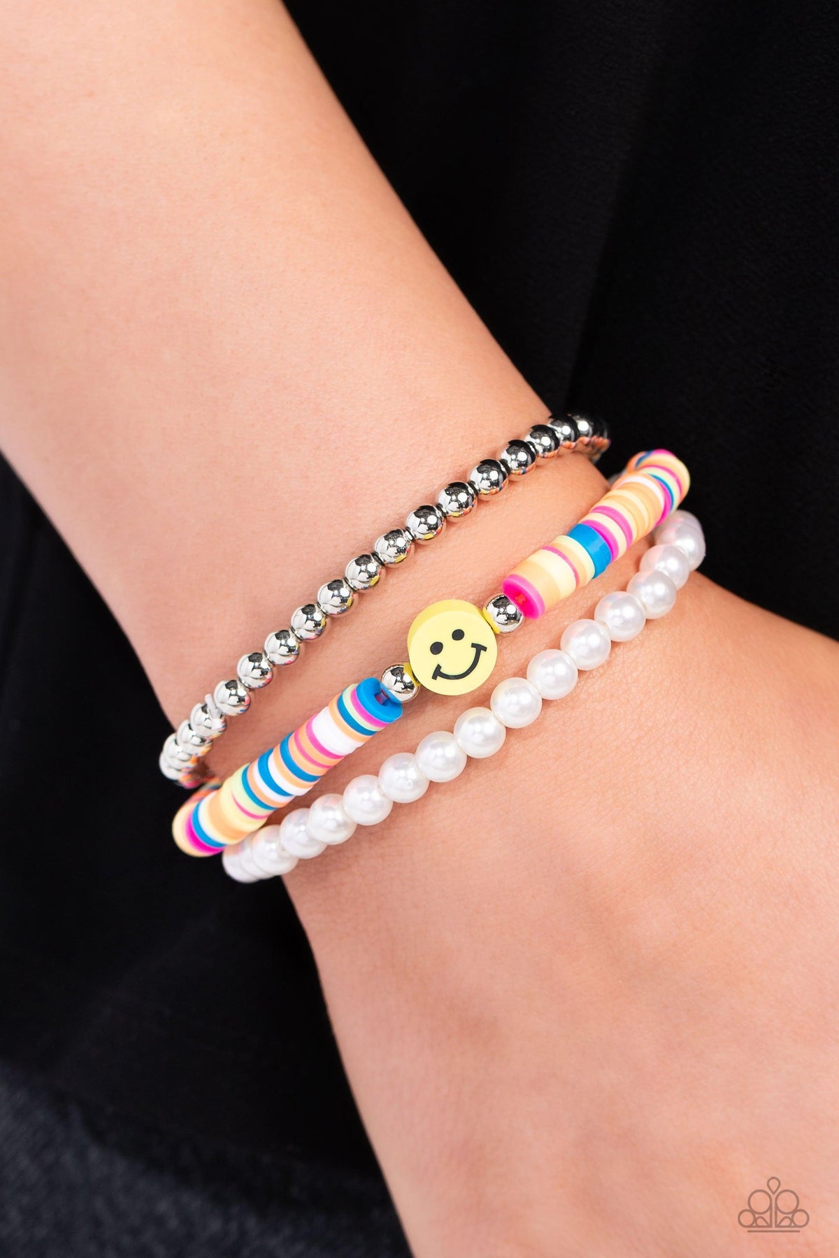 Run a SMILE Multi Happy Face Bracelet - Paparazzi Accessories-on model - CarasShop.com - $5 Jewelry by Cara Jewels