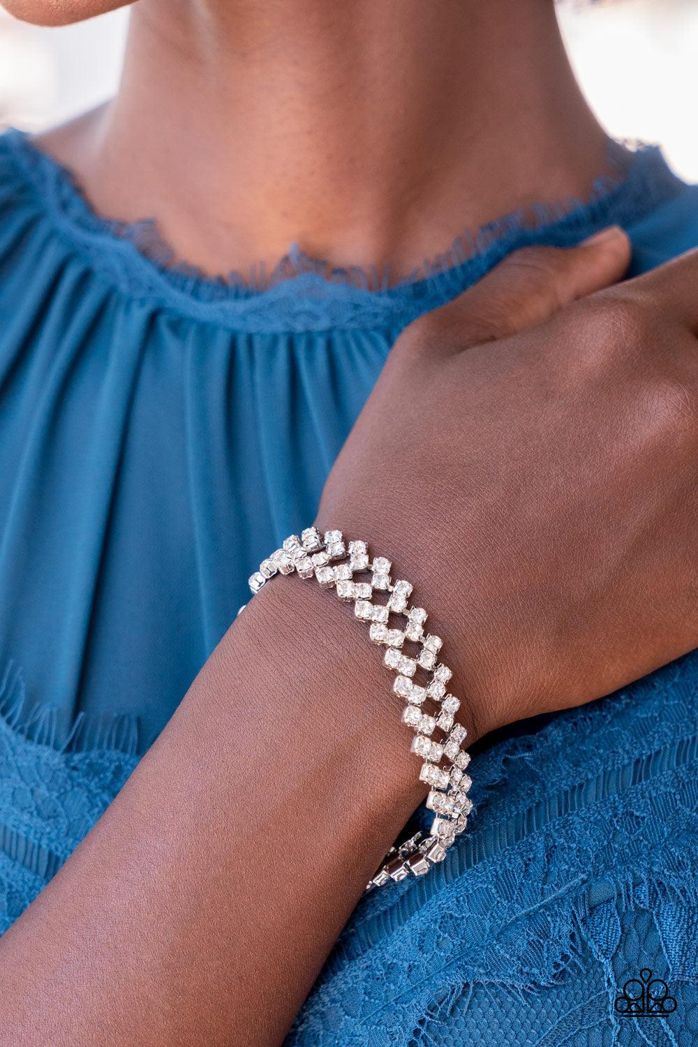 Seize The Sizzle White Rhinestone Bracelet - Paparazzi Accessories-on model - CarasShop.com - $5 Jewelry by Cara Jewels