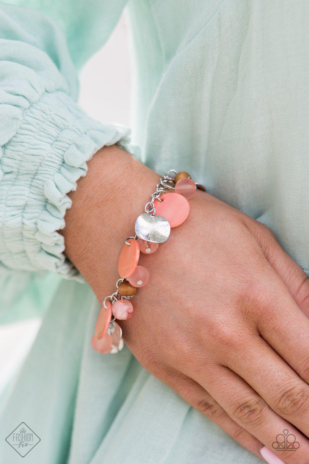 Springtime Springs Coral and Silver Bracelet Set - Paparazzi Accessories- model - CarasShop.com - $5 Jewelry by Cara Jewels