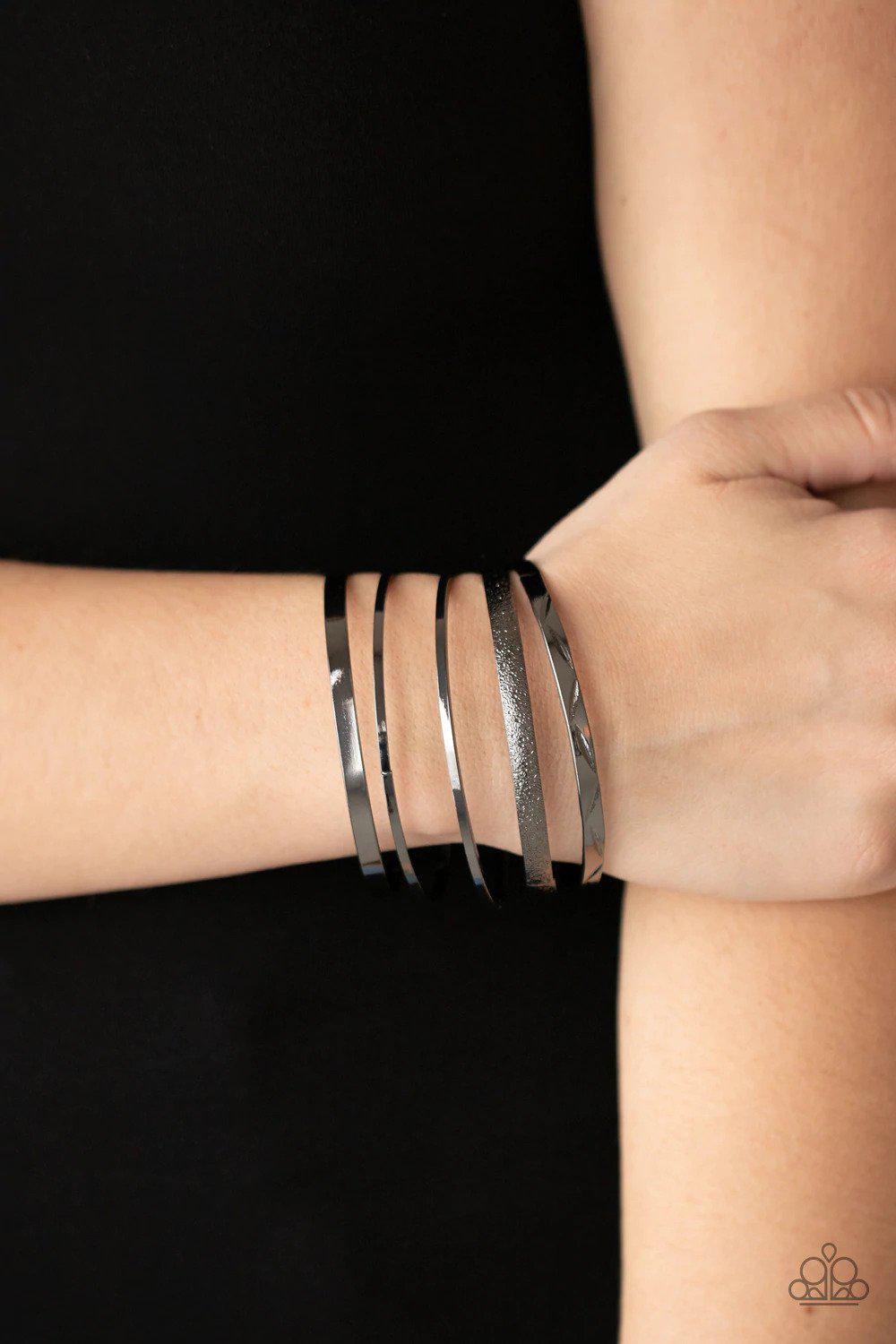 Stackable Style Black Bangle Bracelet Set - Paparazzi Accessories- on model - CarasShop.com - $5 Jewelry by Cara Jewels