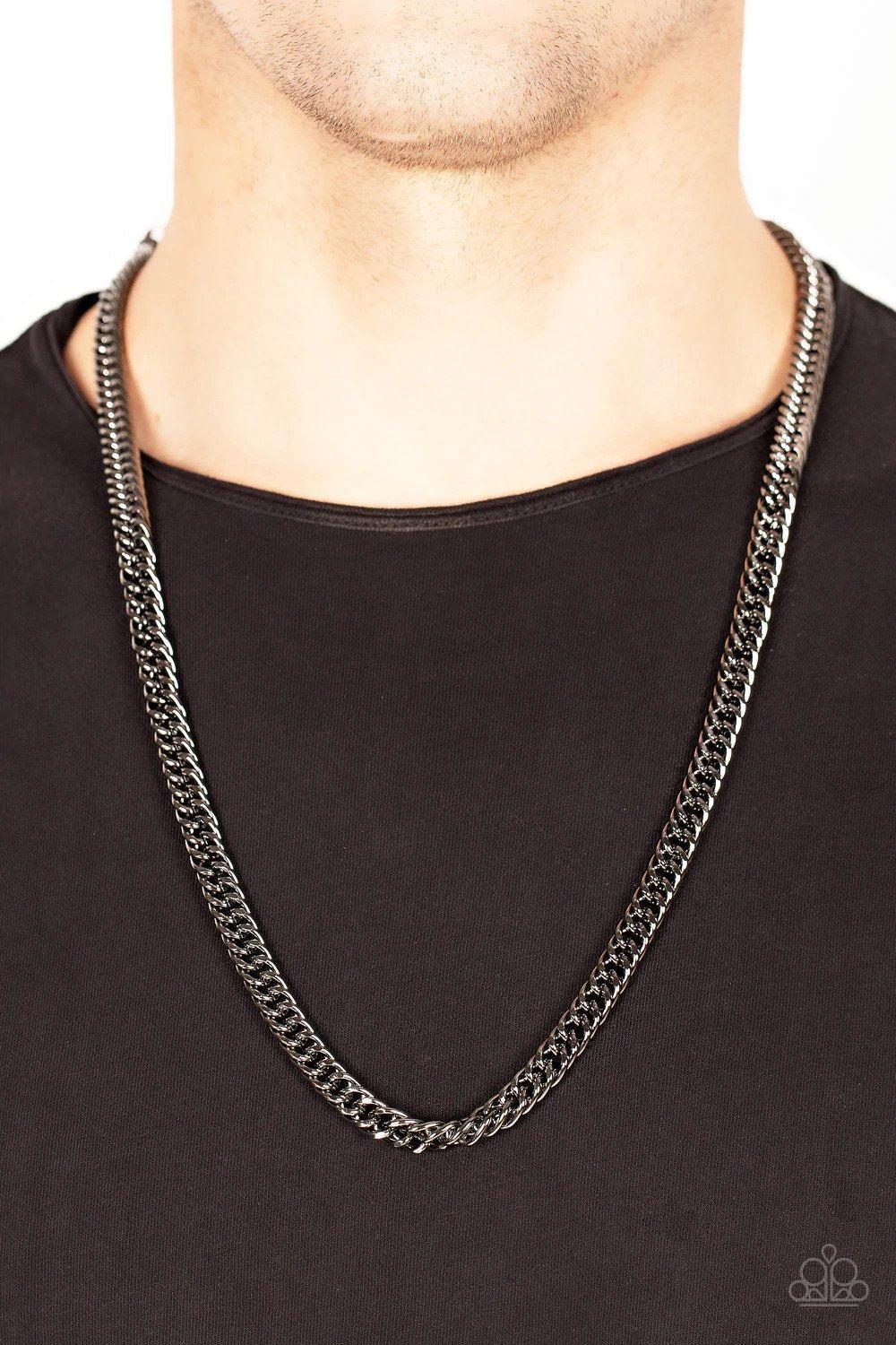 Standing Room Only Men&#39;s Gunmetal Black Necklace - Paparazzi Accessories- on model - CarasShop.com - $5 Jewelry by Cara Jewels