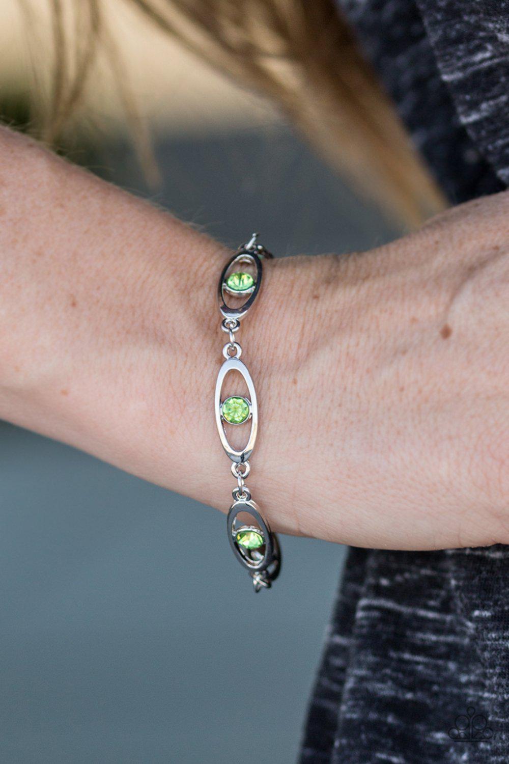 Starry Eyed Silver and Green Rhinestone Bracelet - Paparazzi Accessories-CarasShop.com - $5 Jewelry by Cara Jewels