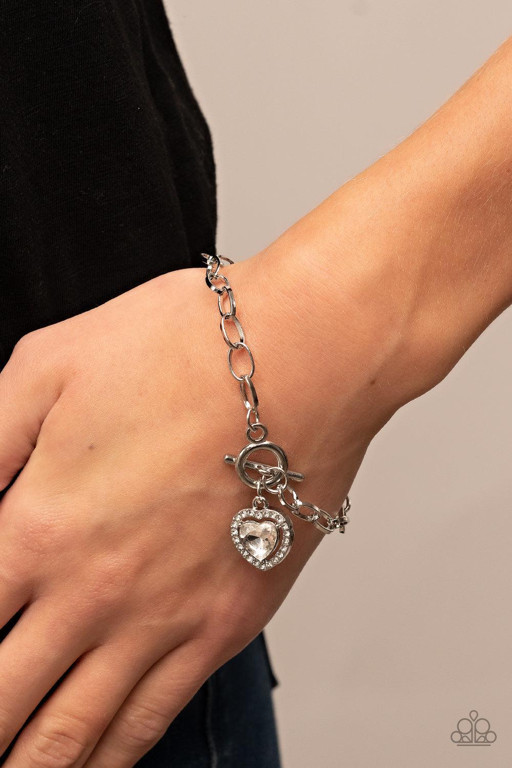 Till DAZZLE Do Us Part White Rhinestone Heart Bracelet - Paparazzi Accessories- on model - CarasShop.com - $5 Jewelry by Cara Jewels