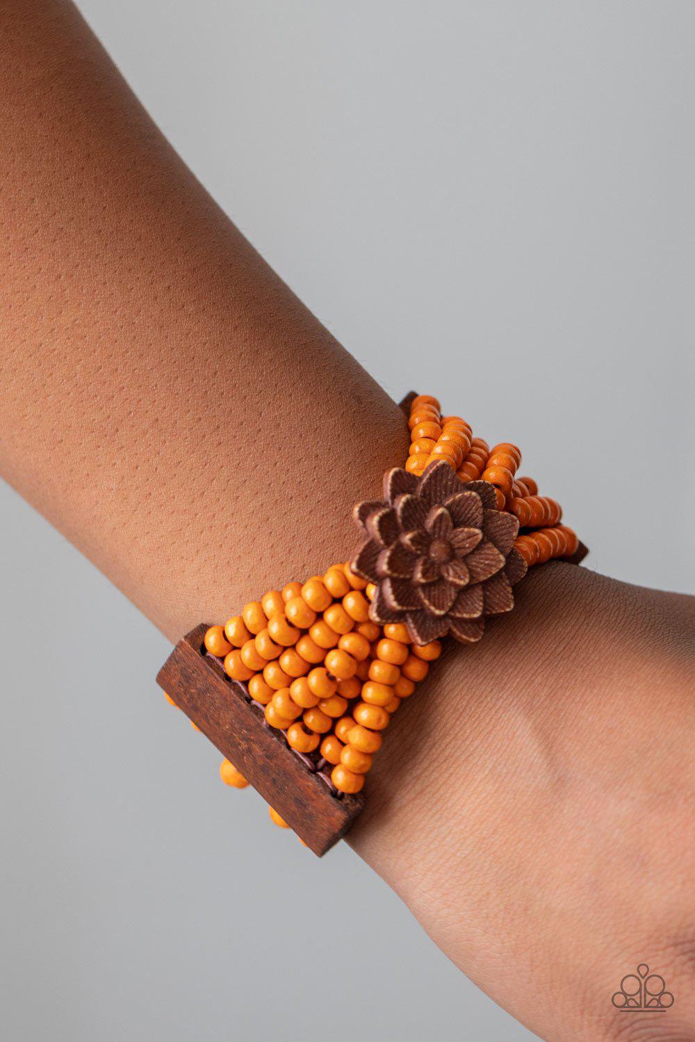 Tropical Sanctuary Orange and Brown Wood Flower Bracelet - Paparazzi Accessories - model -CarasShop.com - $5 Jewelry by Cara Jewels