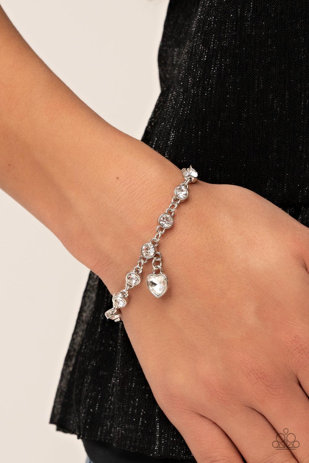 Truly Lovely White Rhinestone Heart Charm Bracelet - Paparazzi Accessories-on model - CarasShop.com - $5 Jewelry by Cara Jewels