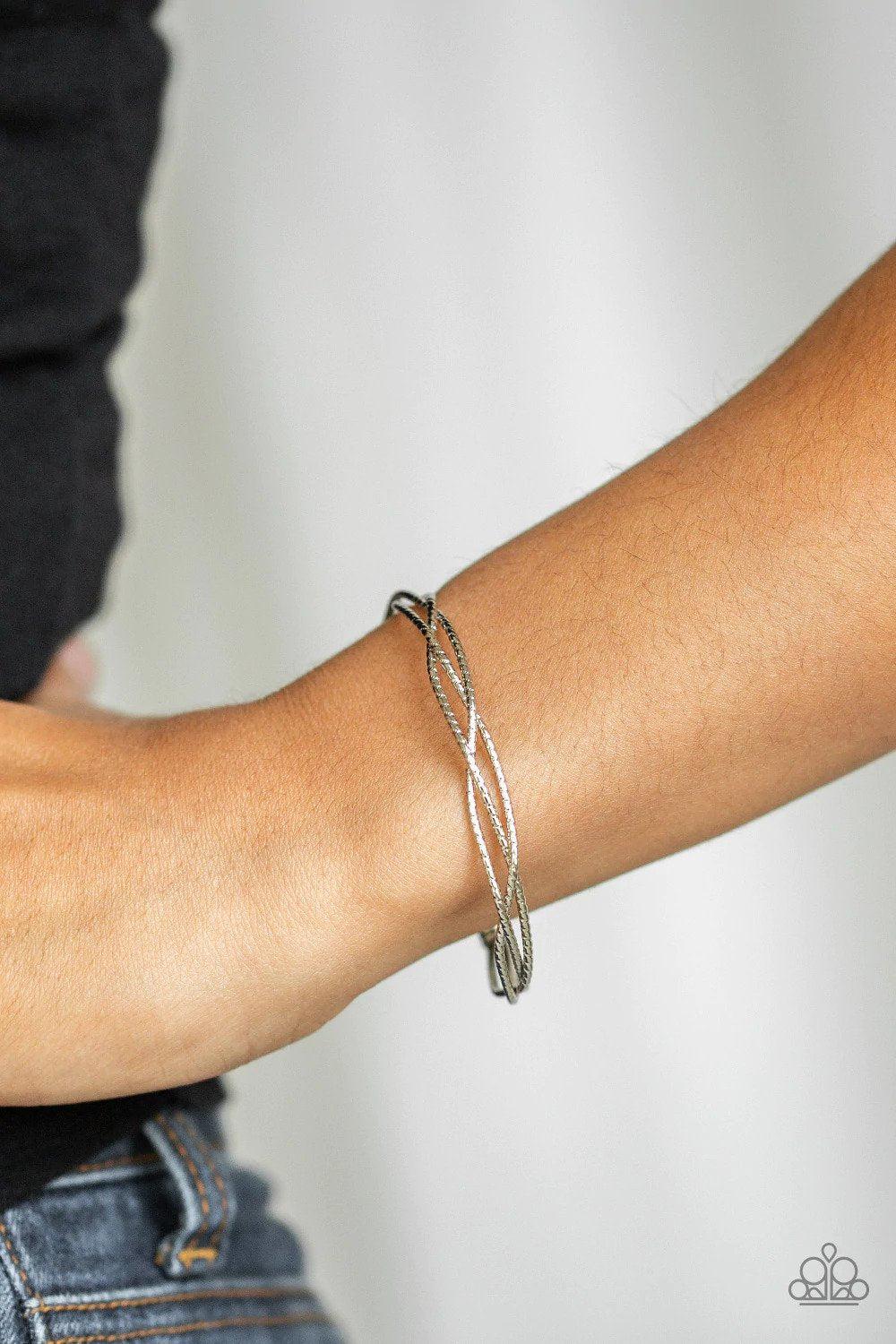 Twist of the Wrist Silver Cuff Bracelet - Paparazzi Accessories- on model - CarasShop.com - $5 Jewelry by Cara Jewels