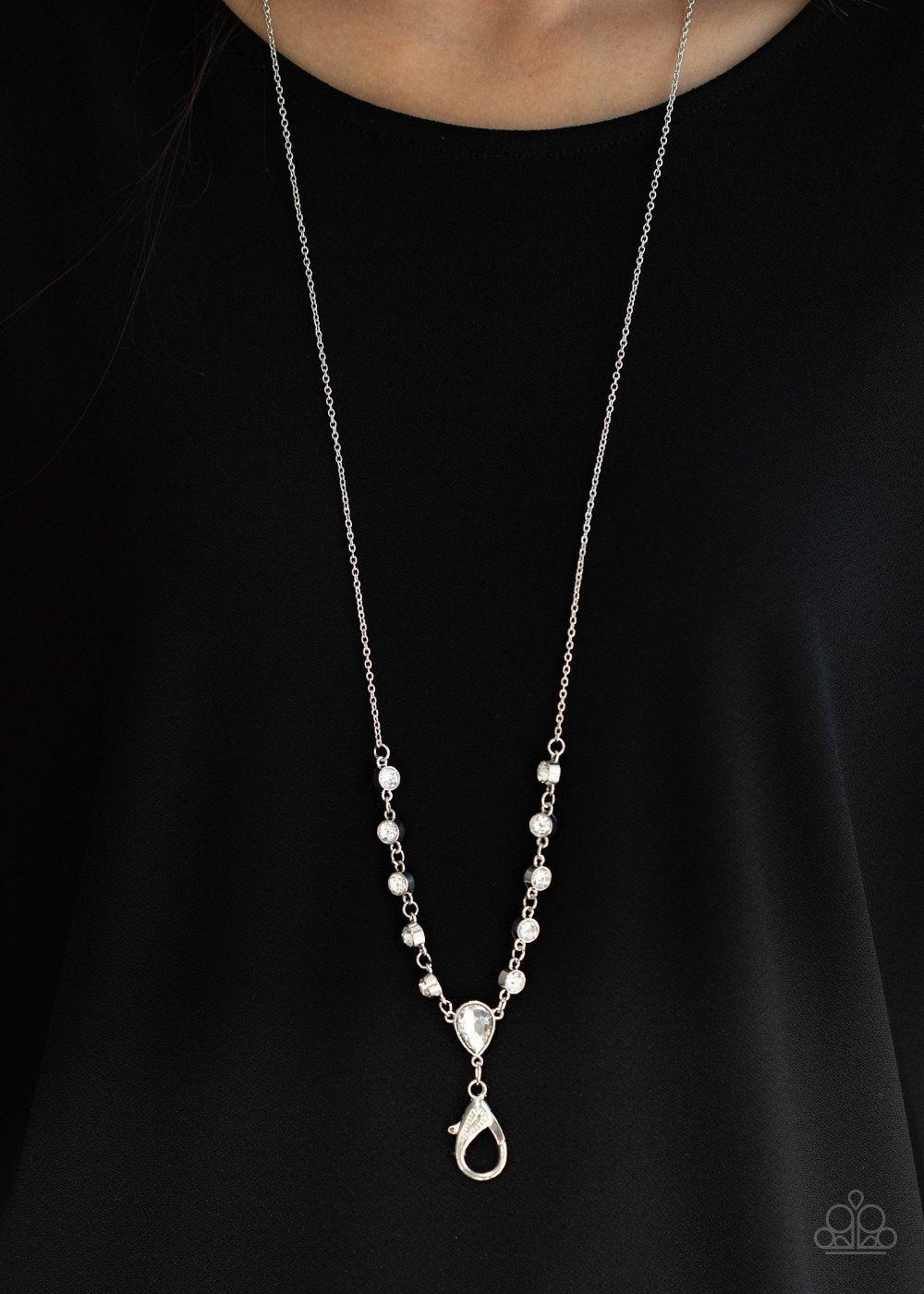 Unfathomable Fierceness White Rhinestone Lanyard Necklace - Paparazzi Accessories- model - CarasShop.com - $5 Jewelry by Cara Jewels