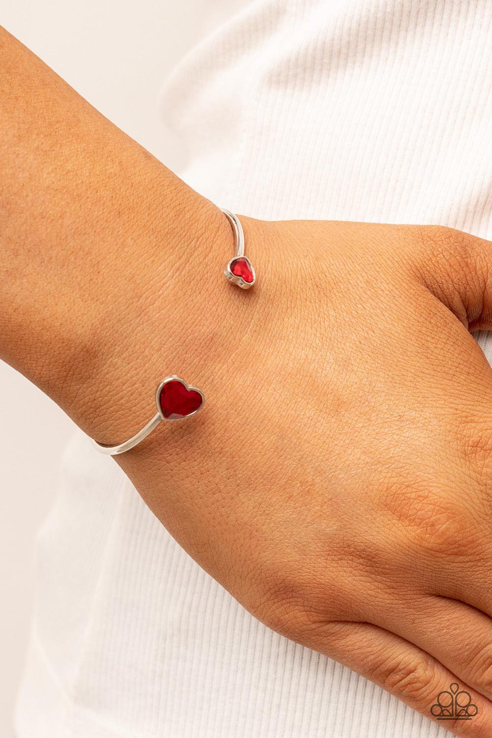 Unrequited Love Red Rhinestone Heart Cuff Bracelet - Paparazzi Accessories- on model - CarasShop.com - $5 Jewelry by Cara Jewels